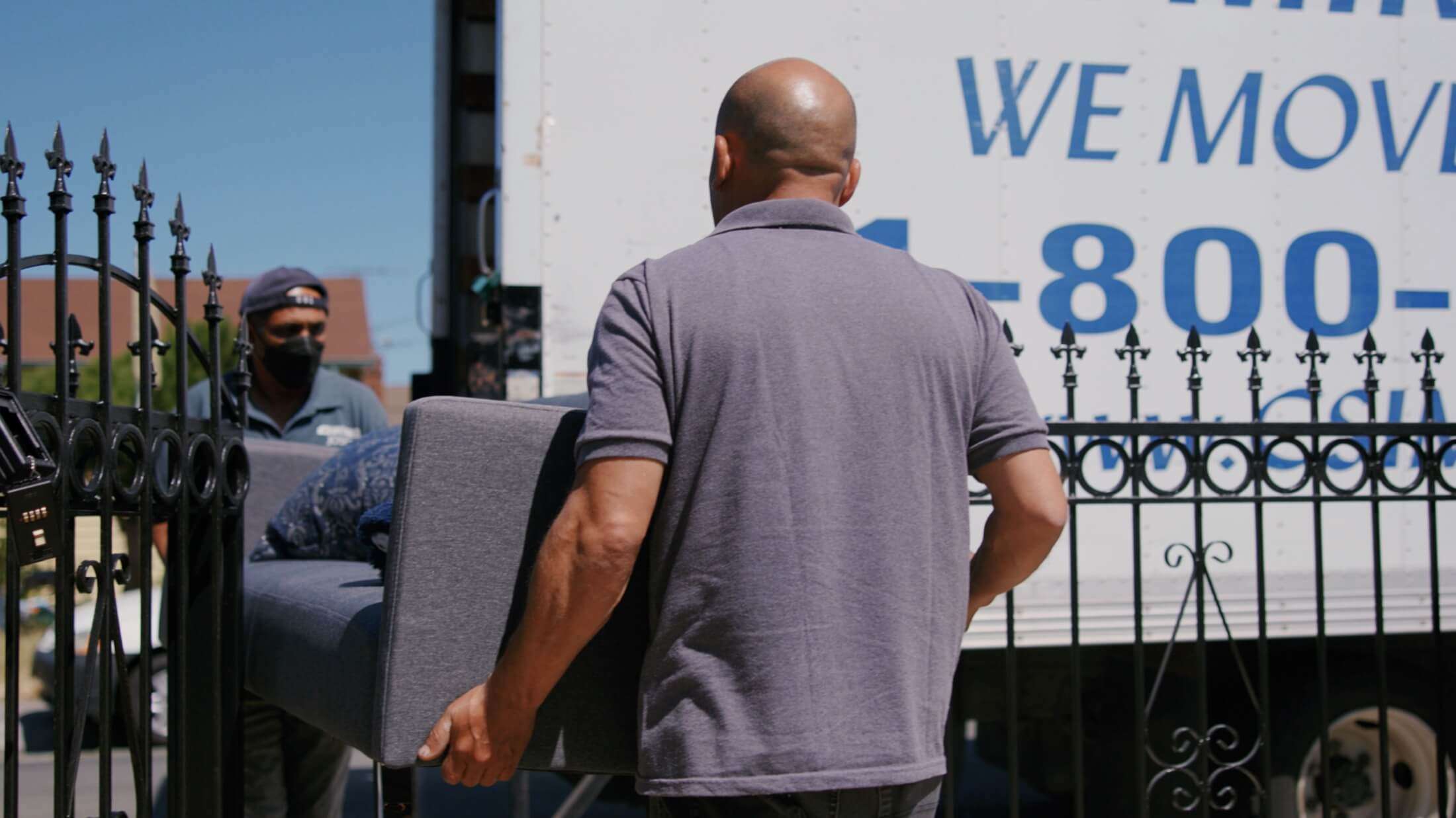 Workers Unloading Truck